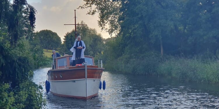 Landing stage for church on River Bure is repaired and blessed after pastoral phone call