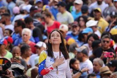 Opposition leader Maria Corina Machado gestures during an anti-government protest on January 9, 2025 in Caracas, Venezuela. According to information shared by the Vente Venezuela Party, Machado was intercepted by government forces deployed by president Nicolas Maduro after finishing her participation in the rally. 