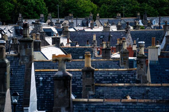 Rooftops of the village of Cullen at at sunset.