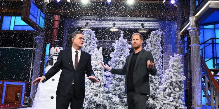 Prince Harry Booed After Trump Quip During Awkward Appearance On Colbert