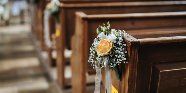 Reduce Church of England wedding fees, think tank urges
