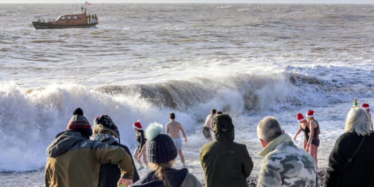 Searches called off after two men missing during Christmas swim presum | UK | News