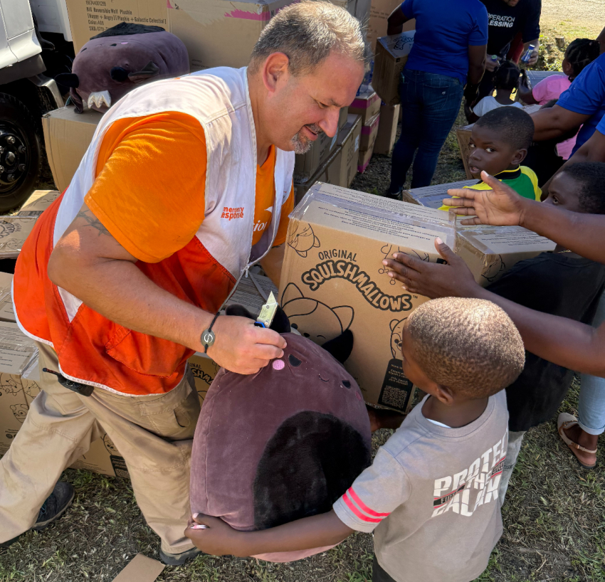 World Vision partnered with Operation Blessing and WaterStep to distribute food kits, disinfectant, and toys in Chester Castle, Jamaica, to help children and families recovering from Hurricane Melissa.