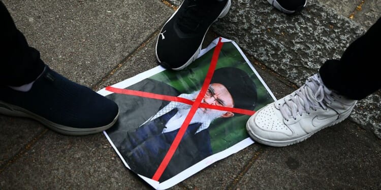 Deaths confirmed as protests against Islamic Republic turn into ‘battlefield’ with regime on brink of collapse