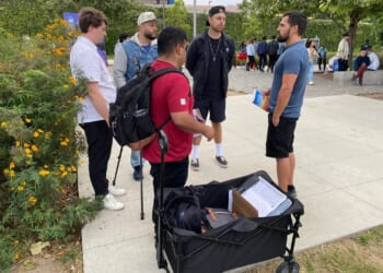 Street preachers handcuffed, detained outside Dallas arena