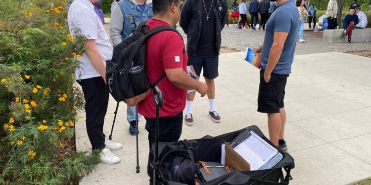 Street preachers handcuffed, detained outside Dallas arena