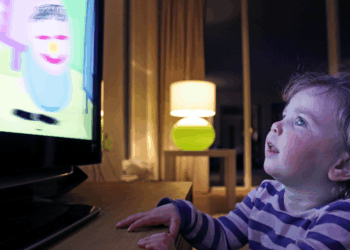 Britain's toddlers spend two hours every day watching screens