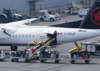 Air Canada flight horror as jet heads towards runway with baggage handler TRAPPED in hold