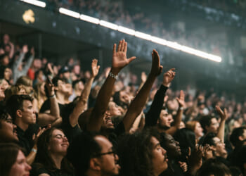 John Piper on whether raising hands in worship is 'showing off'