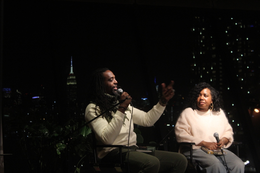 Sharifa Stevens, writer, poet and theologian (R) listens intently as fellow theologian and author Adam Thomason (L) speaks during a discussion of mutual friend, Christian hip-hop artist Lecrae's new book, 