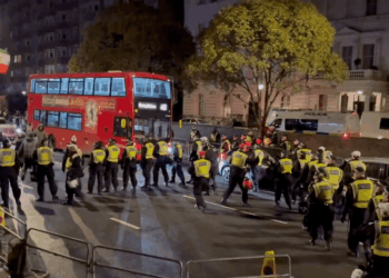 Iran democracy protesters clash with police outside London embassy as multiple arrests made
