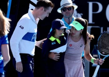 Ball girl collapses as tennis star rushes to support her