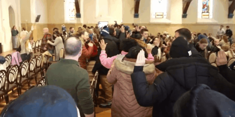 Mob chanting 'justice for Renee Good' storms church over rumours pastor had links to Ice