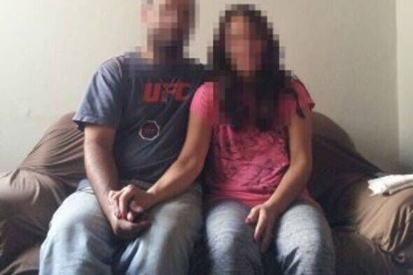 An image depicts two individuals seated on a couch, facing the camera, with expressions of concern or anticipation. The individu