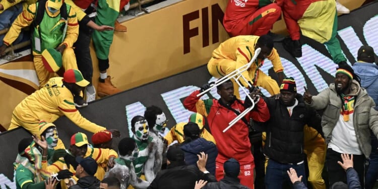 Police arrest 19 football fans over acts of 'hooliganism' after violent clash erupted