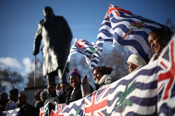 Protesters by the statue of Churchill in Parliament Square