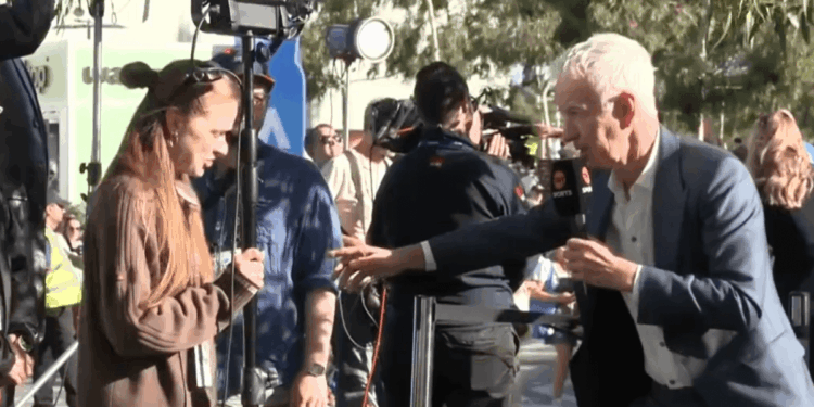John McEnroe goes rogue as tennis commentator pulls woman onto set during Australian Open coverage