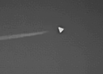 UFO mystery as 'Dorito' shaped craft spotted hovering above top-secret Area 51 base