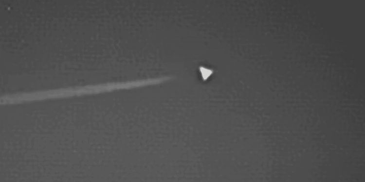 UFO mystery as 'Dorito' shaped craft spotted hovering above top-secret Area 51 base