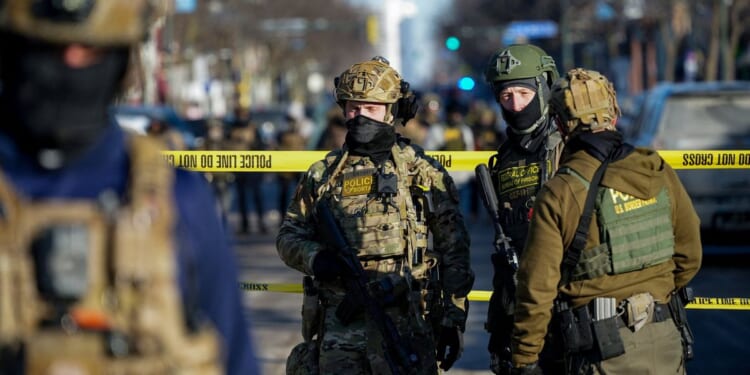 Federal agents open fire on man 'with firearm' amid major Ice protests