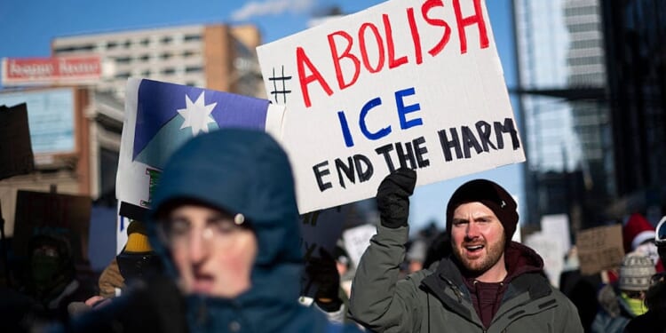 Armed Protester Killed, Dems Threaten Shutdown, & Trump Sends Warships To Middle East