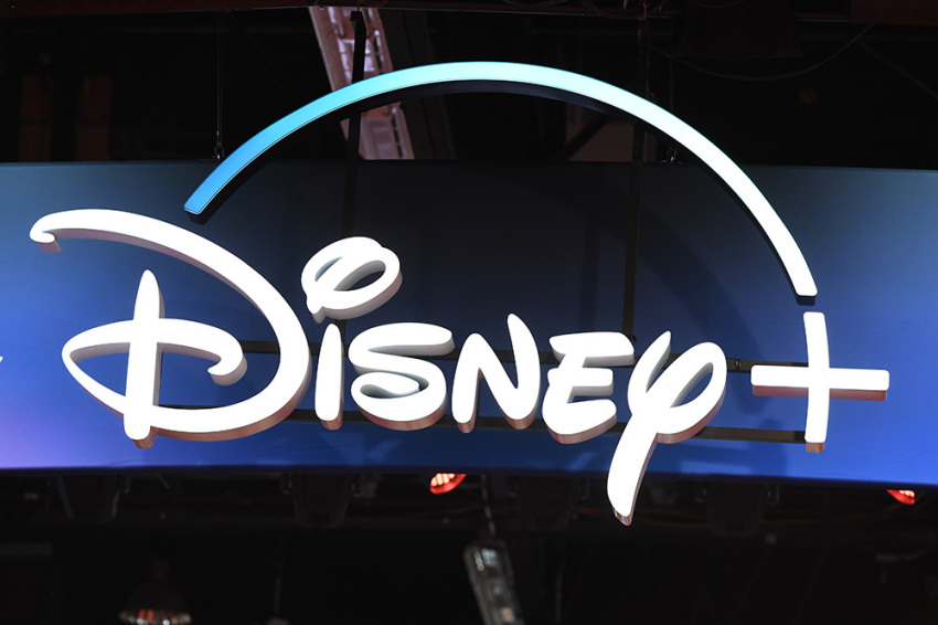 A Disney+ streaming service sign is pictured at the D23 Expo, billed as the 
