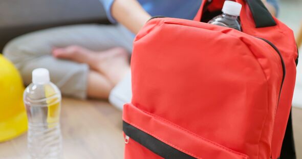 Asian woman Emergency Kit Prep