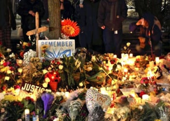 ICE shooting of mother prompts vigils and protests in Minnesota