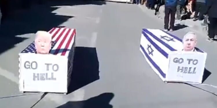 Iranians drag coffin with Trump's face on it through streets as WW3 fears soar | World | News