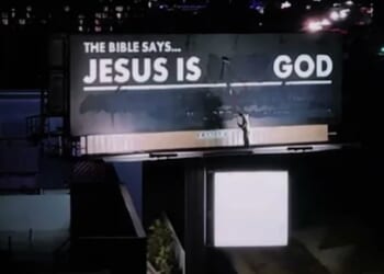 Man paints over heretical billboard to read 'Jesus is God'