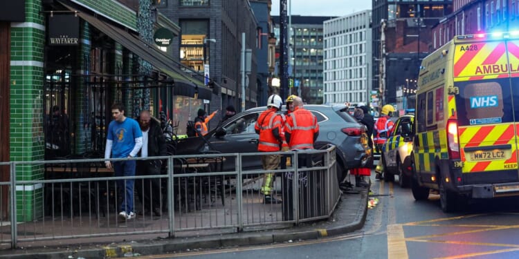 Manchester crash LIVE: Police rush to city centre after car nearly crashes into bar | UK | News