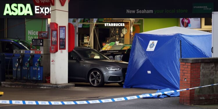 Murder probe launched after police swarm Asda Express garage | UK | News