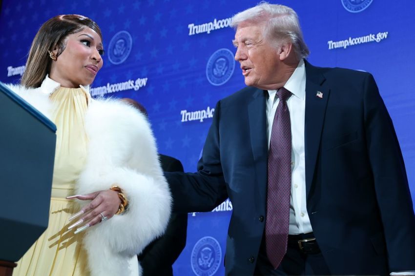 Rapper Nicki Minaj (L) joins U.S. President Donald Trump on stage during the Treasury Department's Trump Accounts Summit at Andrew W. Mellon Auditorium on January 28, 2026 in Washington, DC.