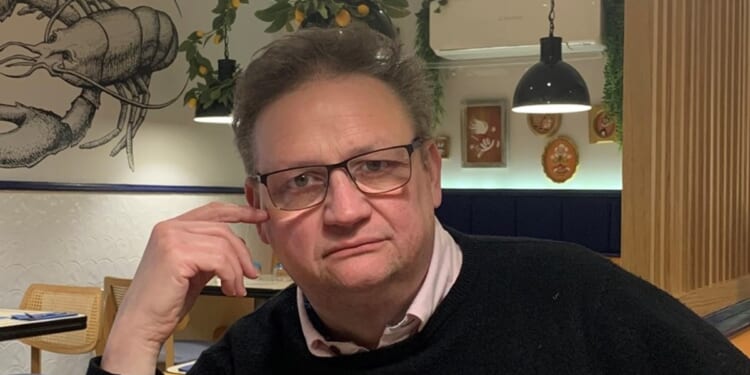 Obituary: Canon Jim Garrard