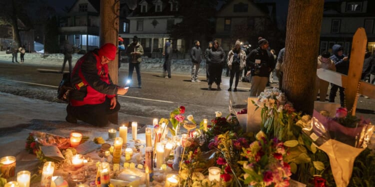 Political leaders offer conflicting accounts in Minneapolis ICE shooting