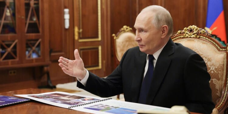 Russia sends submarine to escort 'Axis of Evil' | World | News