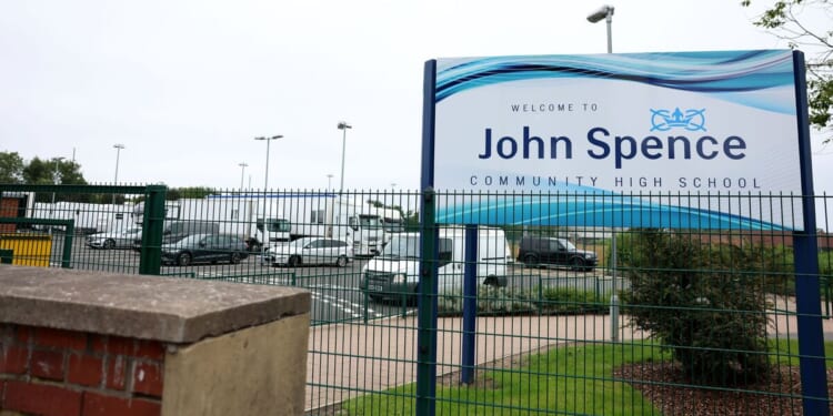 School plunged into lockdown after man seen with 'suspected weapon' | UK | News