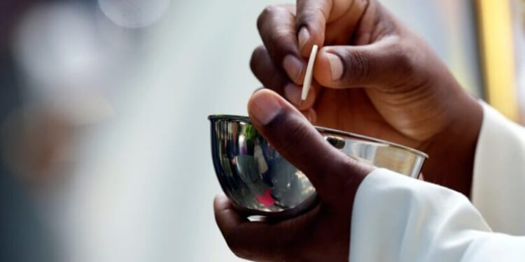 Spain blocks priests giving last rites after deadly train crash. Does Vatican II agree?