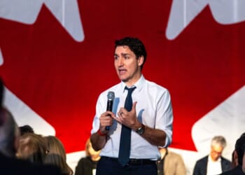 Trudeau appears to laugh after reporter tells him cameraman's mom died from COVID shot