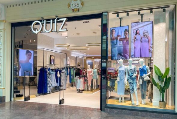 outside a quiz store