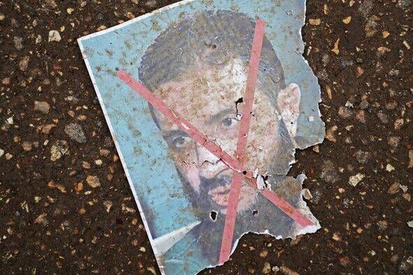 Crossed-out image of President Ahmed al-Sharaa