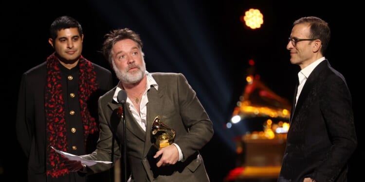 Dalai Lama wins Grammy award as stars rush to red carpet | US | News