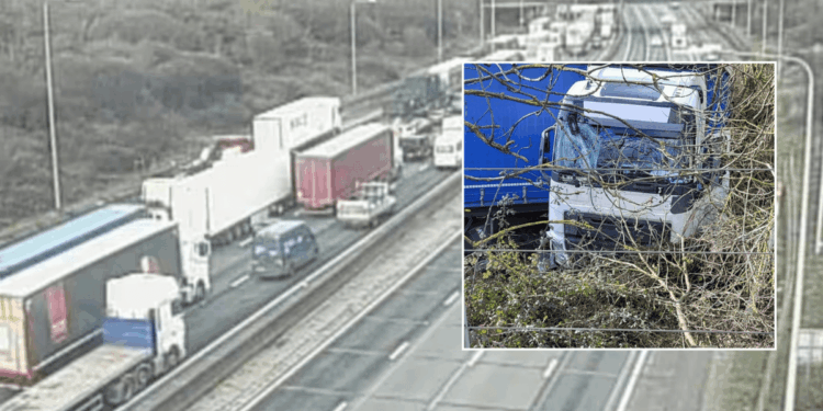 Drivers face long delays as lorry crashes into power line causing 'exposed wires' and electric failures