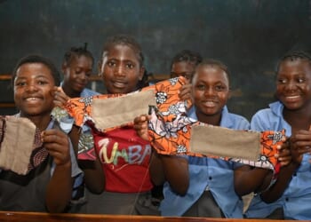 Activists work with World Vision to talk period poverty