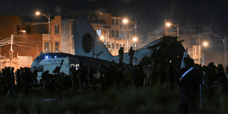 At least 15 dead after aircraft packed with banknotes crashes onto motorway