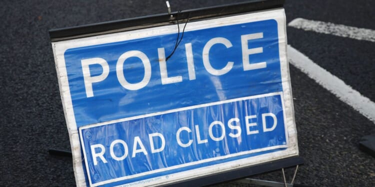 Commuter road to be closed for hours after car strikes tree | UK | News