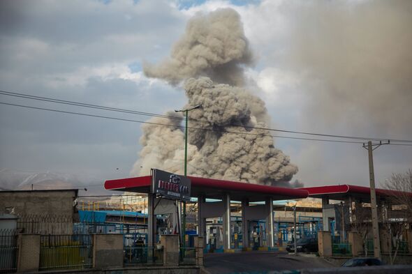 A plume of smoke rises after an explosion on March 2, 2026 in Tehran, Iran. A plume of smoke rises after an explosion on March 2, 2026 in Tehran, Iran.