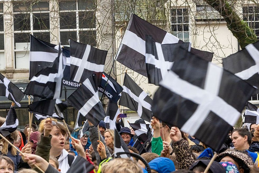 \u200b: A sea of St Piran's flags (Cornish Flags) was seen outside Truro Cathedral