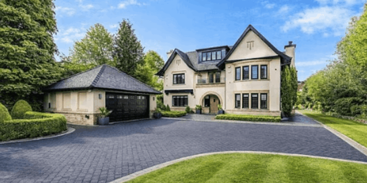 Manchester United legend lists £3.5million five-bedroom mansion for sale despite drop in price