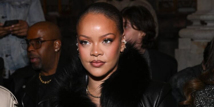 Shooter arrested after 'firing multiple rounds into singer's Beverly Hills home while she was inside'